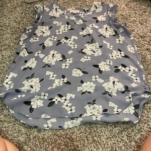 Purple flowered tank top with ruffled sleeve detail